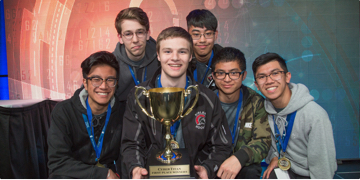 Competition winners with trophy